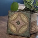 a square made from broken pieces of tiles mosaic