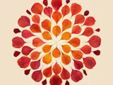 impression artwork fading from dark red to orange petal dots in a circular effect