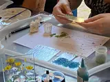 a person doing glass fusing doing a workshop